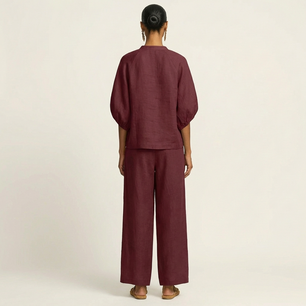 Ensemble Danoir Paris Marlowe à manches bouffantes avec zip, vue de face, détail du tissu et du design moderne.