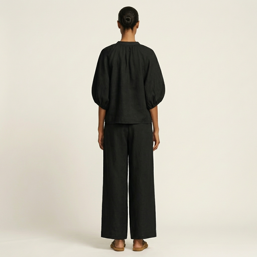 Ensemble à manches bouffantes et zip Danoir Paris, vêtements tendance pour femmes, vue de face avec détails de design.