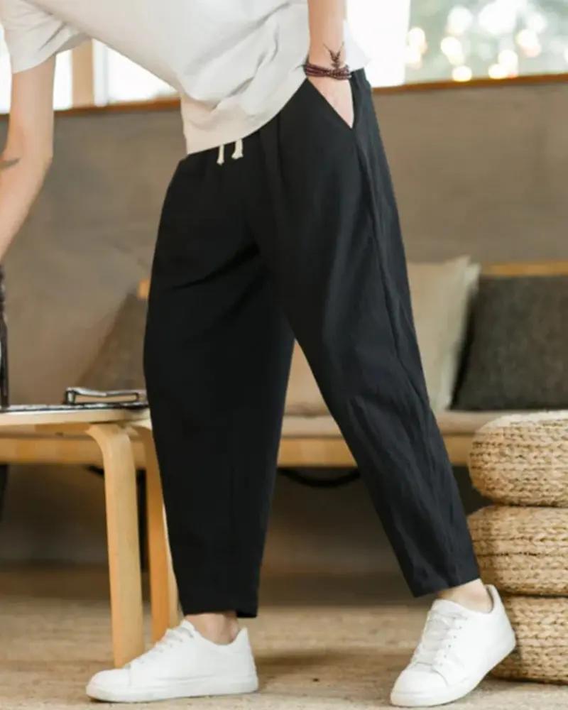 Pantalon beige en coton Old Money Cancun, coupe décontractée et tissu léger, parfait pour un style élégant et confortable.