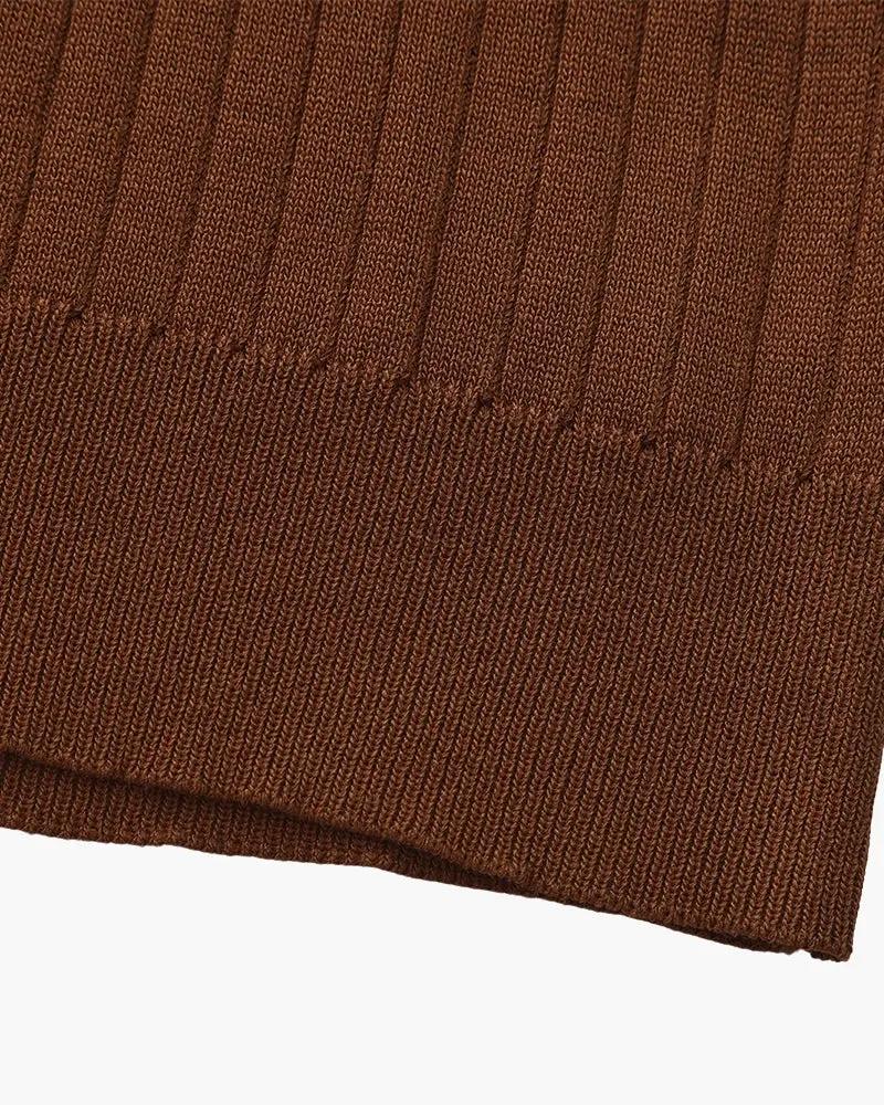 Polo en maille côtelée beige de la marque Old Money, vue de face, taille XS, détail de texture côtelée, style classique.