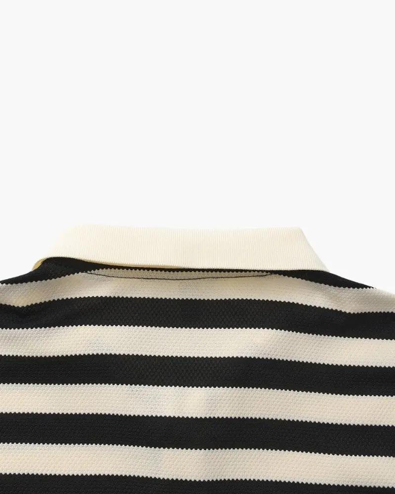 Polo Shoreline Old Money noir en coton avec col classique, vue de face.