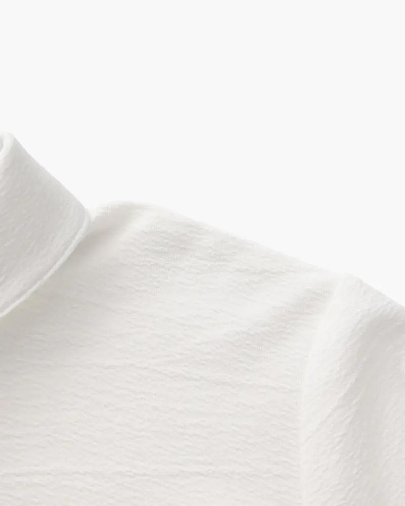 Ensemble polo en coton noir et pantalon pour homme de la marque Old Money, vue de face.