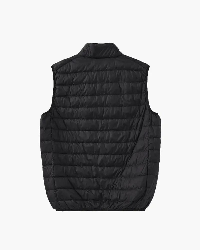 Gilet matelassé noir Old Money pour homme, léger et chaud, avec col montant et fermeture éclair.