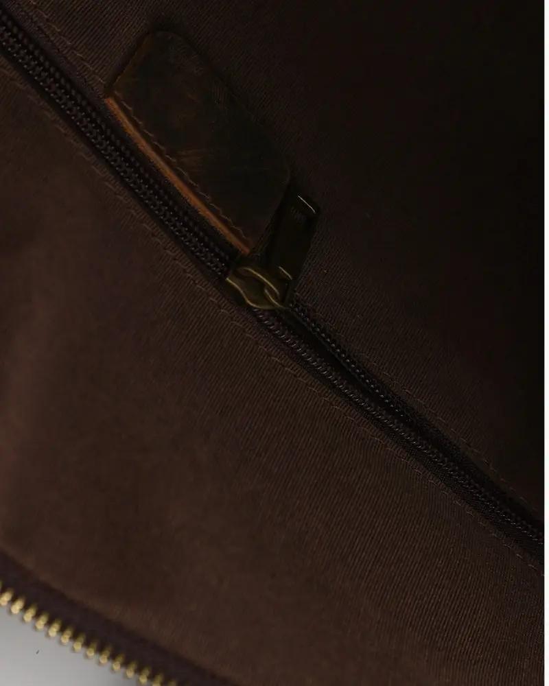 Sac de voyage en cuir marron Montague Old Money, sac duffle élégant avec poignées robustes et détails en cuir.