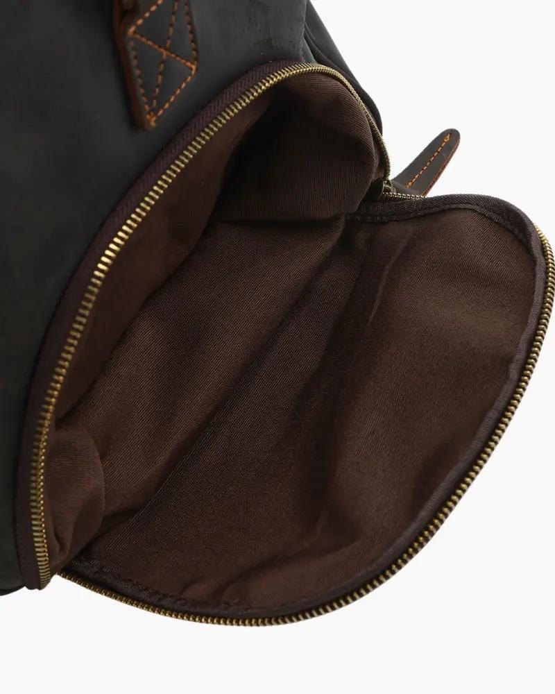 Sac de voyage en cuir Old Money Montague Duffle marron, avec poignées robustes et finition élégante.