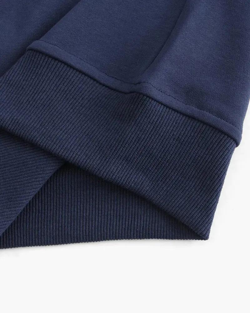Veste zippée en coton Miami de la marque Old Money, en bleu, avec capuche et détails de style décontracté.