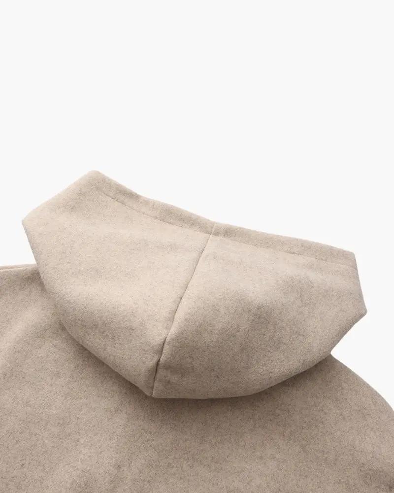 Manteau en laine beige avec zip de la marque Old Money Women, style élégant et chaud pour femmes.