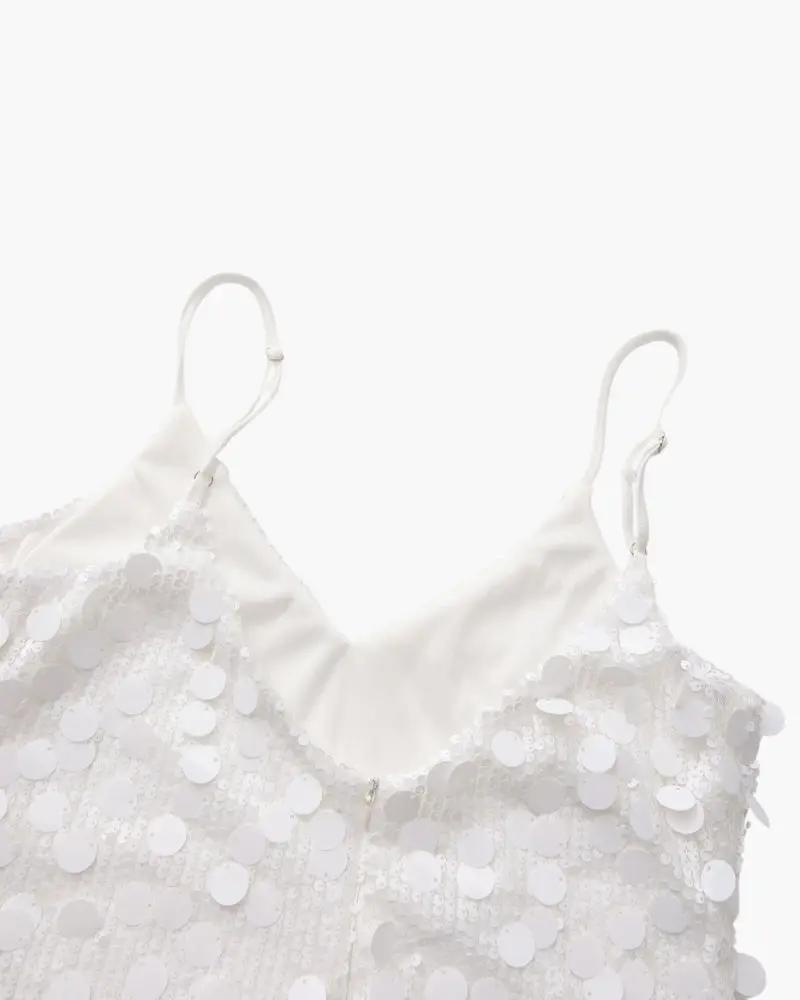 Robe courte de soirée en sequins rose doré de la marque Old Money Women, avec décolleté élégant et finition brillante.