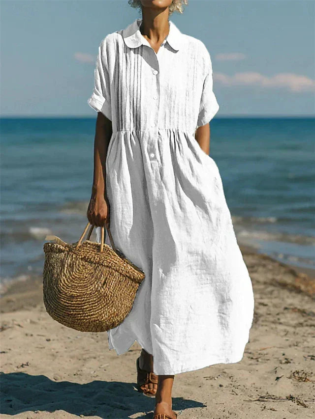 Robe en lin blanc élégante pour femmes de la marque Van Rozen Utrecht, style sobre et sophistiqué.
