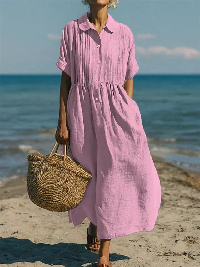 Robe en lin blanc élégante pour femmes de la marque Van Rozen Utrecht, design fluide et sophistiqué, portée décontractée ou formelle.