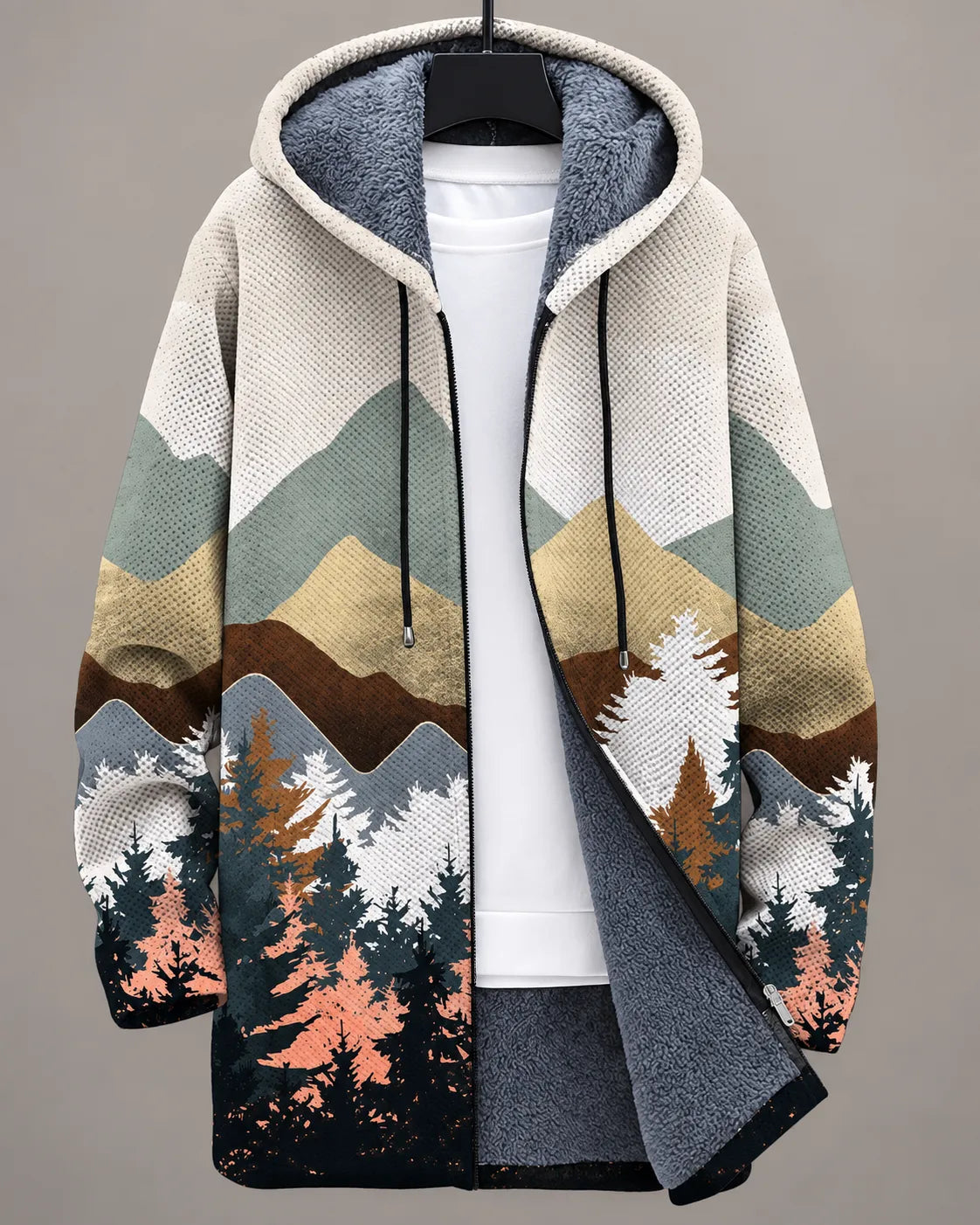 Veste à capuche Elara Danoir Paris avec motif vue sur les montagnes, tissu confortable et style décontracté, portée en extérieur.