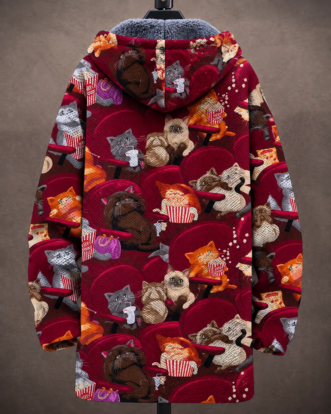 Veste à capuche Delilah avec motifs de chats de cinéma, Danoir Paris, tissu doux et détails modernes visible sur l'image.