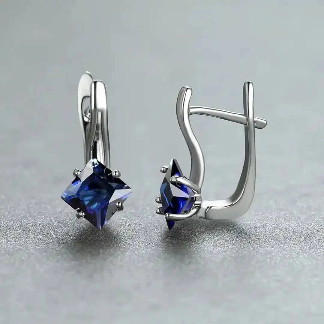 Boucles d'oreilles Sylvette Azurienne Danoir Paris en argent avec motifs floraux et détails élégants.