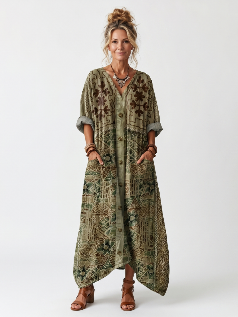 Robe midi oversize Danoir Paris avec poches brodées, fermeture à boutons, tissu fluide et style décontracté.