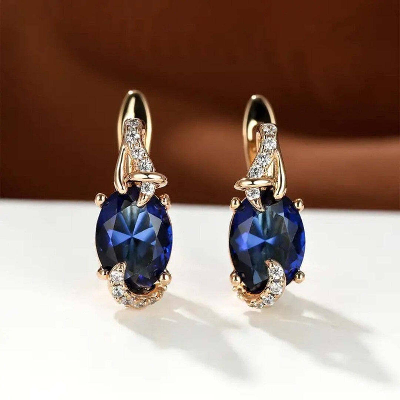 Boucles d'oreilles Regal Midnight Danoir Paris avec pendentifs en forme de goutte noire élégante.