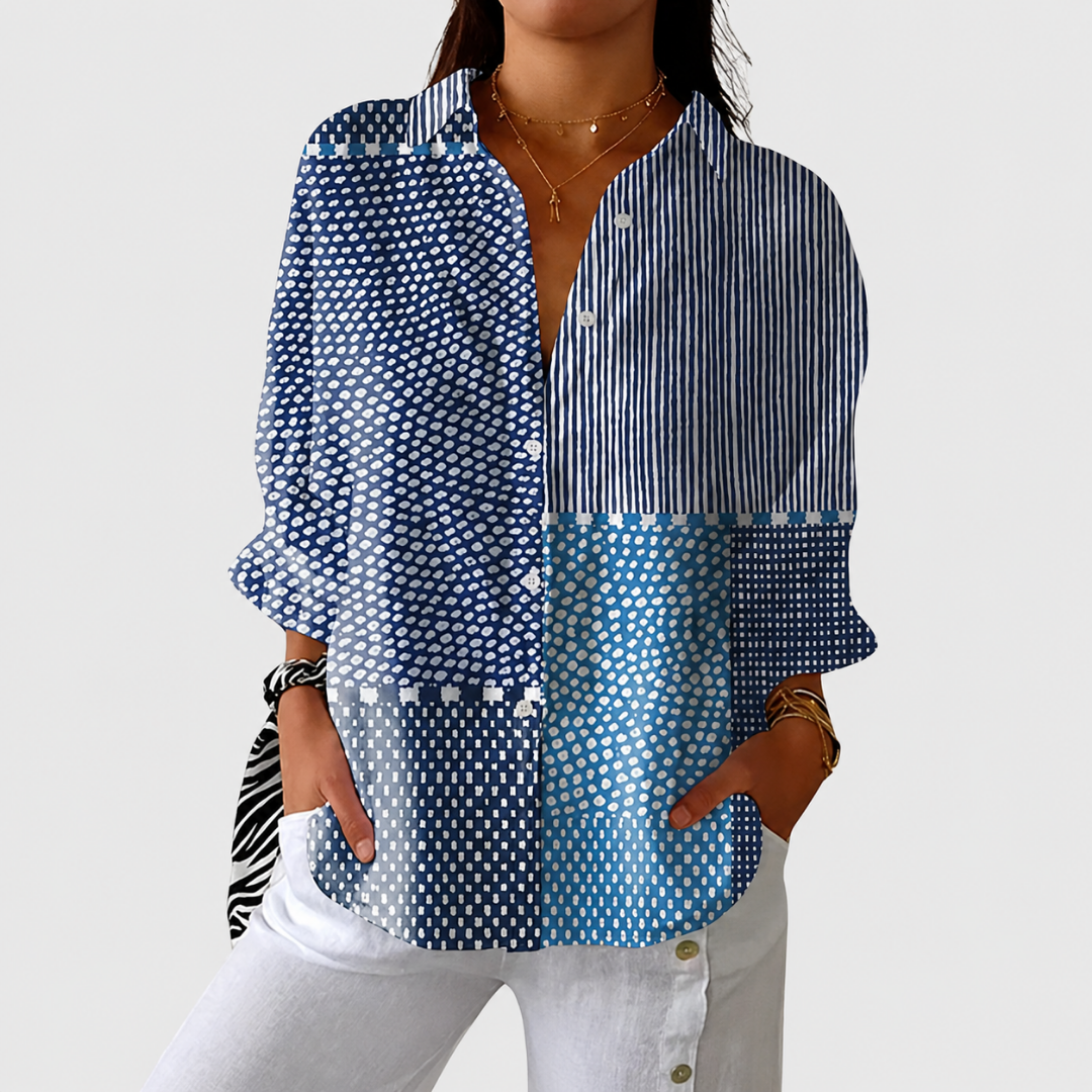 Blouse colorée et lumineuse à imprimé, fabriquée par Danoir Paris, avec un design léger et fluide.