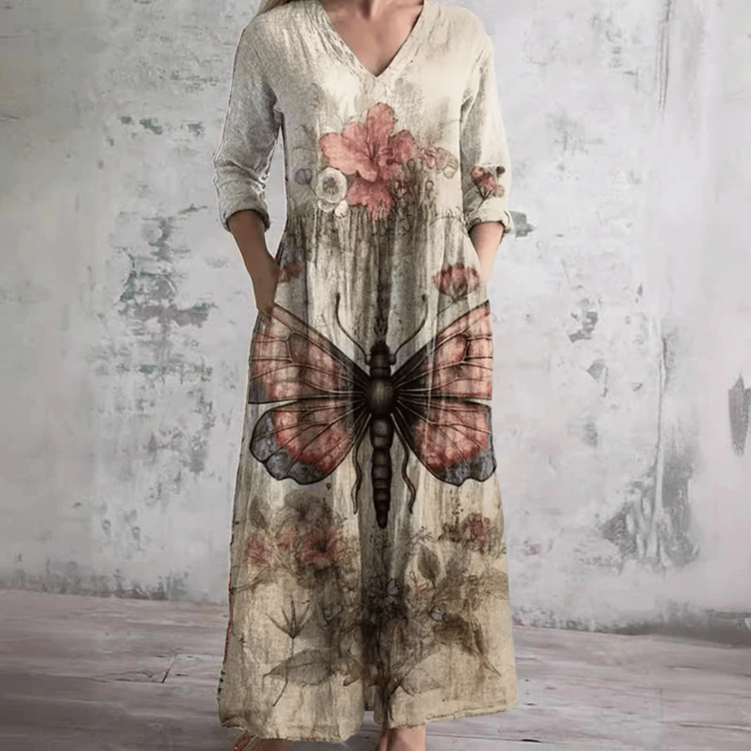 Robe d'été florale Evelyn™ de Danoir Paris, tissu léger avec motif floral, portée élégante pour l'été.