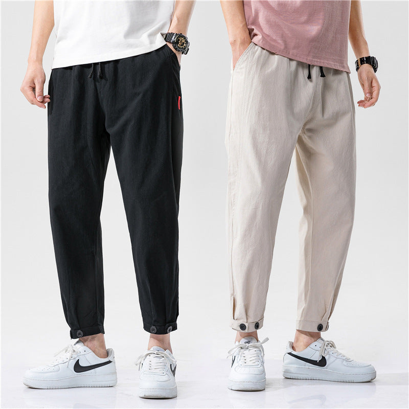 Pantalons ajustés en coton Theo de Danoir Paris, coupe moderne et tissu confortable, vue de face sur un mannequin.