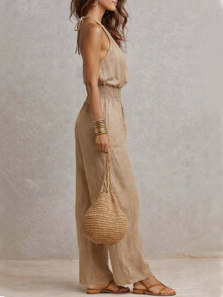 Combinaison pantalons larges à col halter Danoir Paris Valeria, style élégant et moderne, en tissu fluide beige.