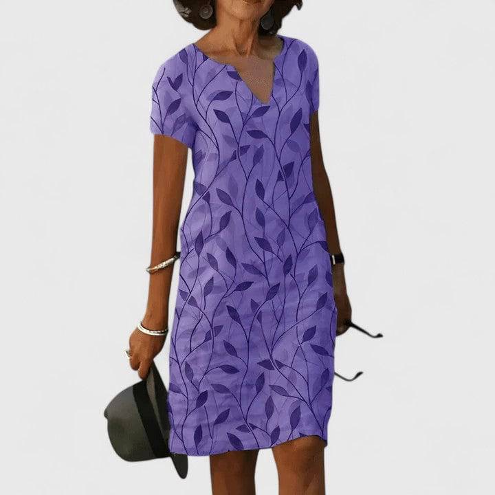 Robe d'été élégante Danoir Paris Calisse en tissu léger, avec design fluide et détails sophistiqués, portée sur un mannequin.