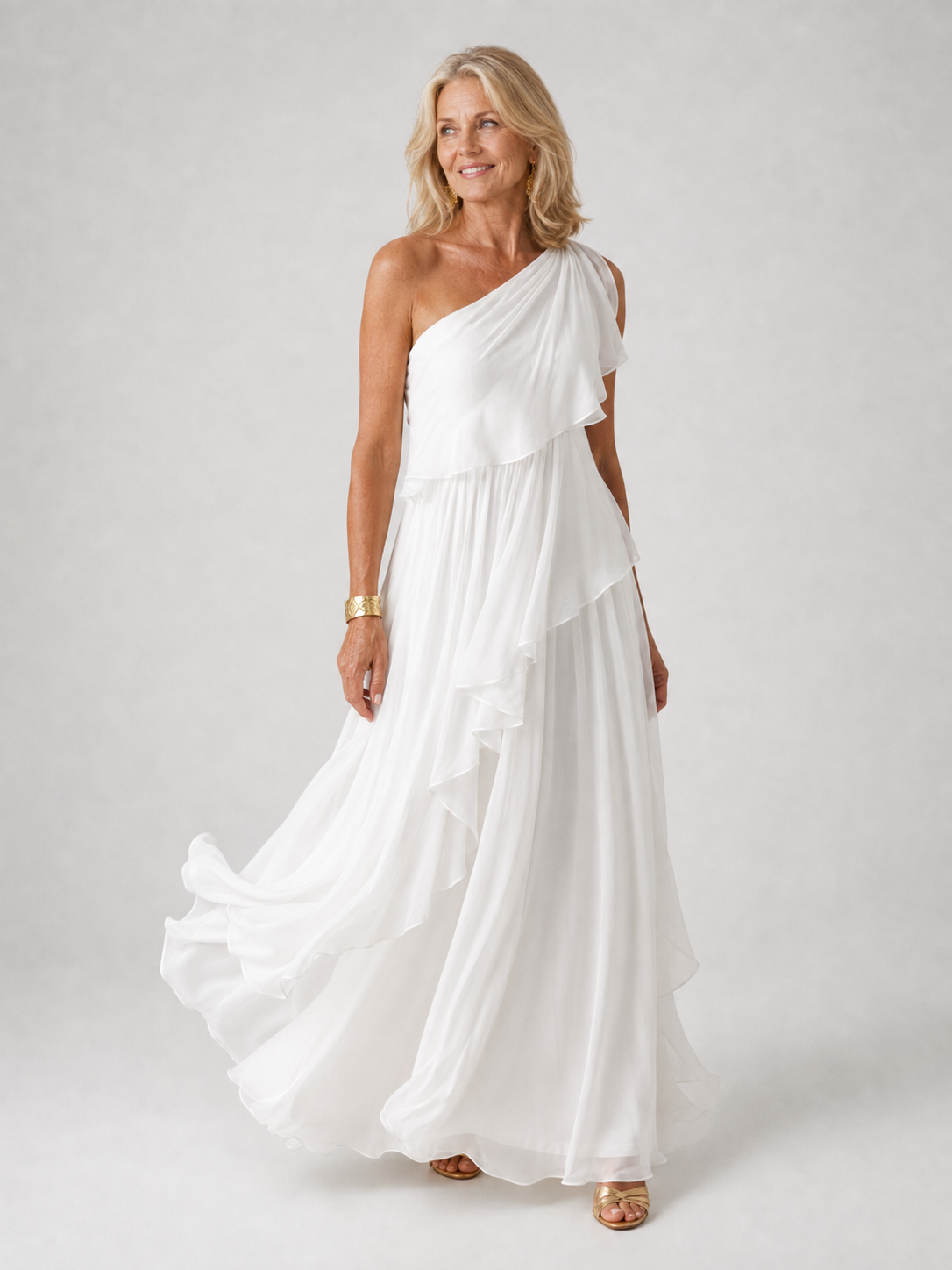 Robe longue femme Danoir Paris Victoria avec épaules dénudées et volants, tissu fluide et élégante pour occasions spéciales.