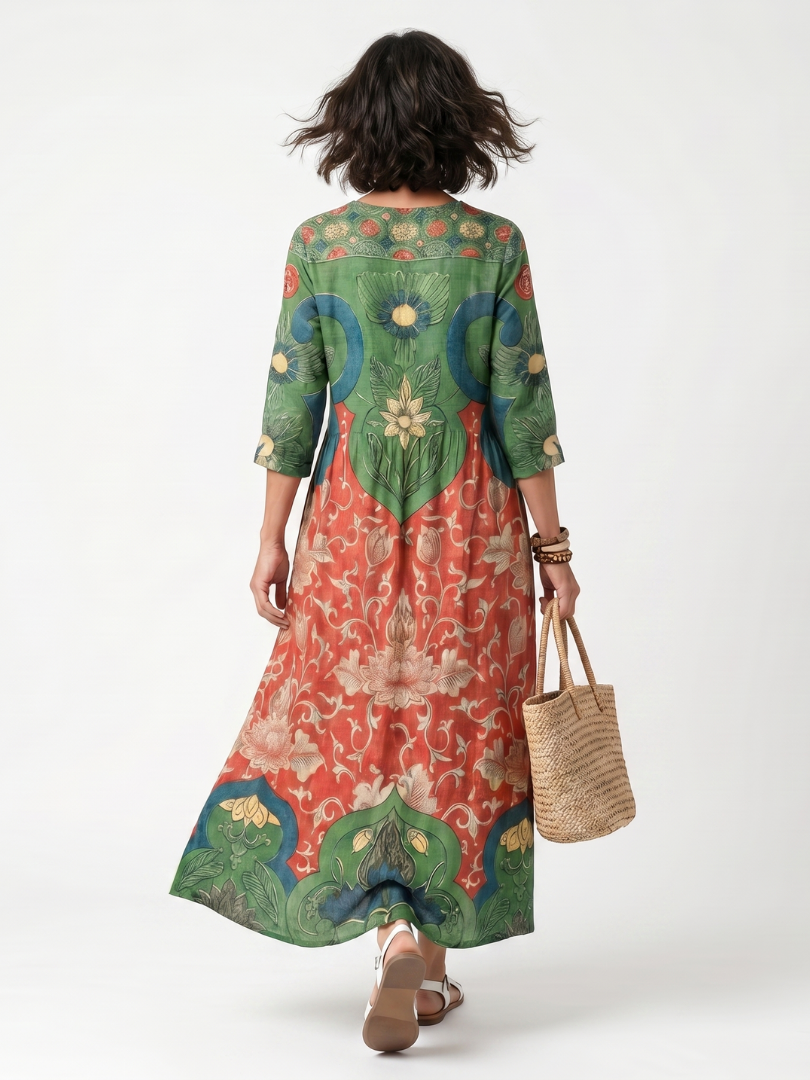 Robe midi Danoir Paris Sloane à imprimé mixte, col en V, poches, longueur mi-mollet, style élégant et décontracté.