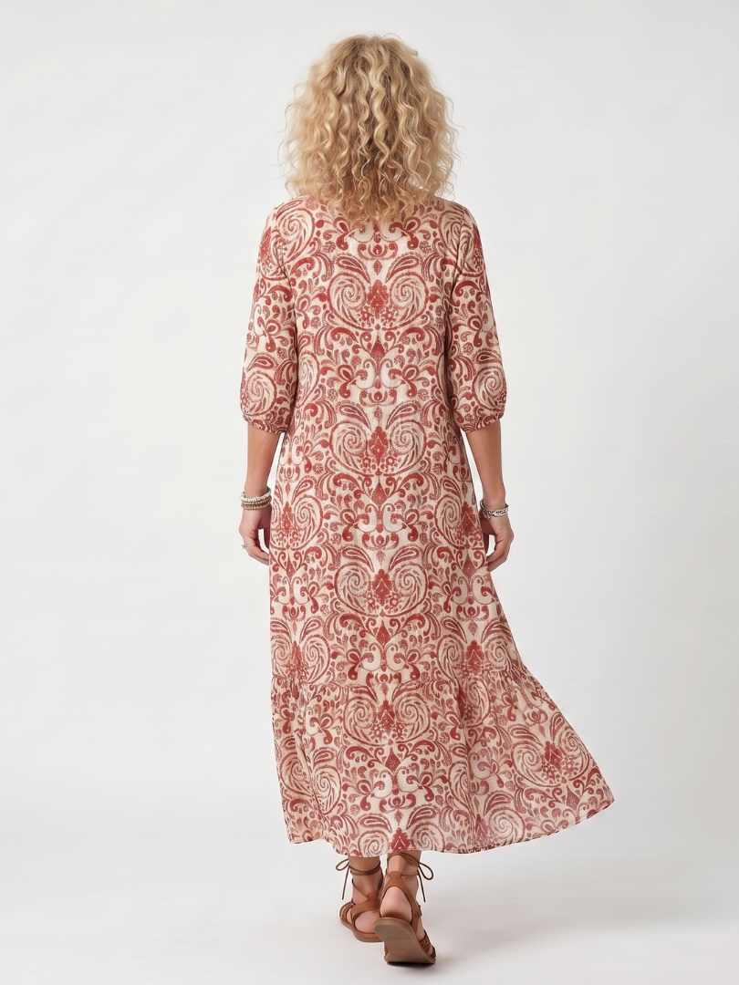 Robe midi Danoir Paris Noelle à motif ornemental avec franges et liens, vue de face sur fond blanc.
