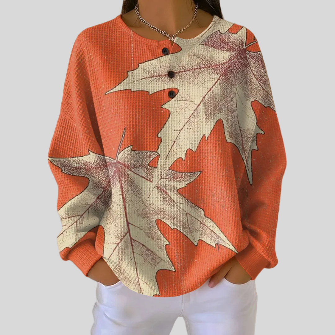 Sweat-shirt Danoir Paris Eleanor à col boutonné avec motif feuille d'automne, tissu doux et confortable, vue de face.
