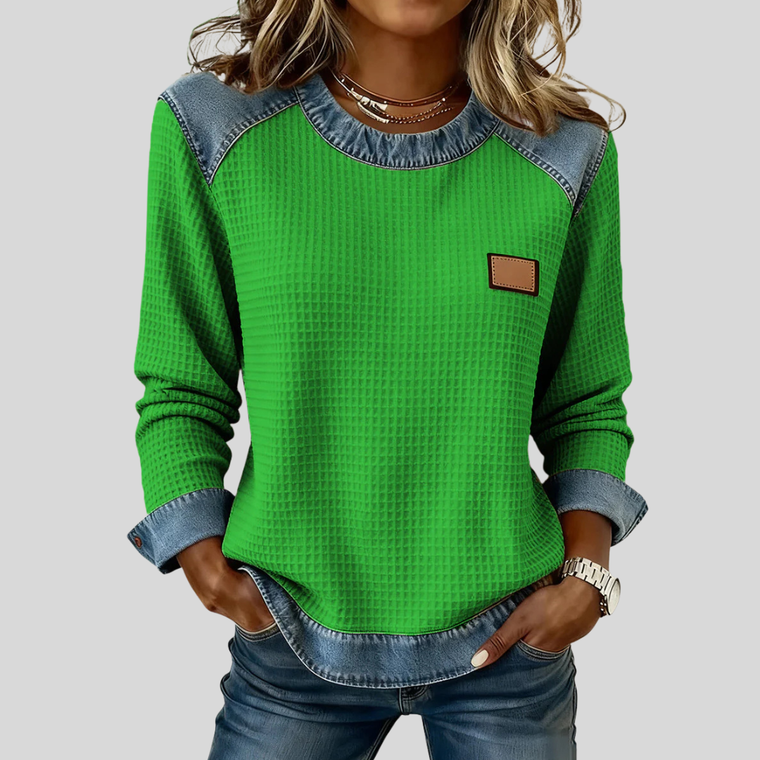 Sweat-shirt Danoir Paris Marlisa à col contrasté texturé, avec coupe décontractée et détails modernes, porté sur un mannequin.