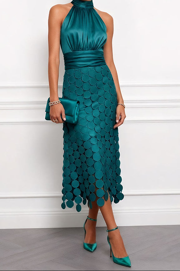 Robe midi élégante Danoir Paris de la marque Celine, parfaite pour les cérémonies, en tissu fluide et coloris sophistiqué.