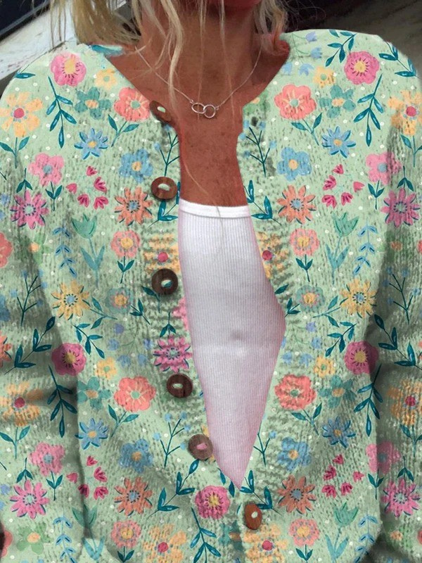 Cardigan vintage floral pour femmes Foxfield™ de Danoir Paris, en laine avec motif fleuri coloré et boutonnières élégantes.