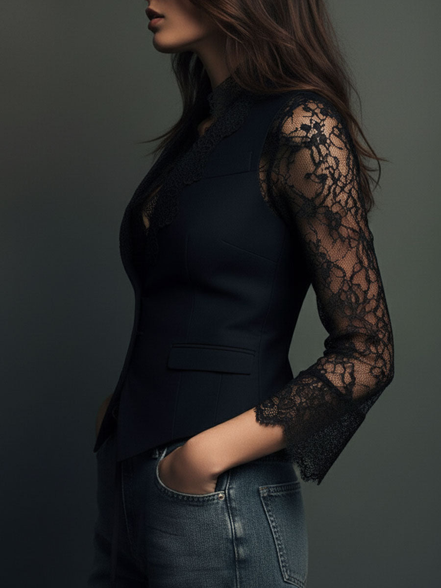 Blazer noir Noémie de Danoir Paris avec manches semi-transparentes, coupe élégante et détails modernes.