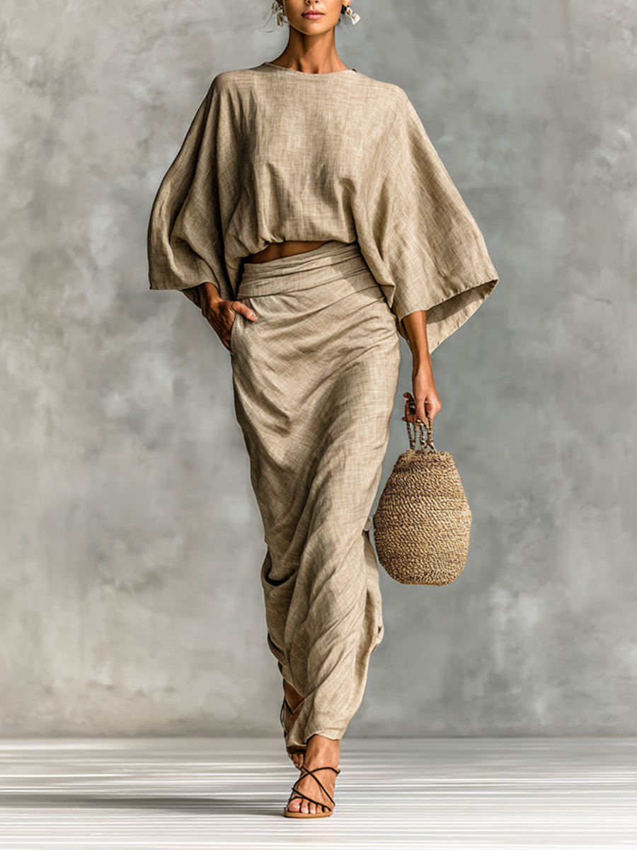 Robes Paule de Danoir Paris, ensemble jupe à manches longues en tissu léger, élégante et moderne.