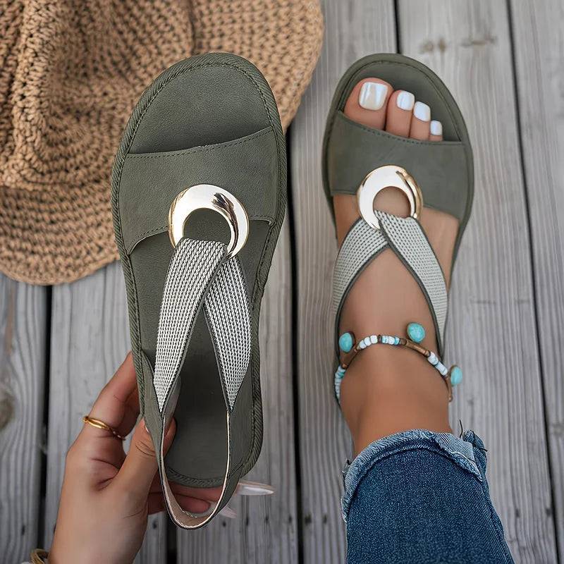 Sandales Luna Côtières de Danoir Paris avec anneau en coquillage, sandales plates en cuir naturel pour femmes.