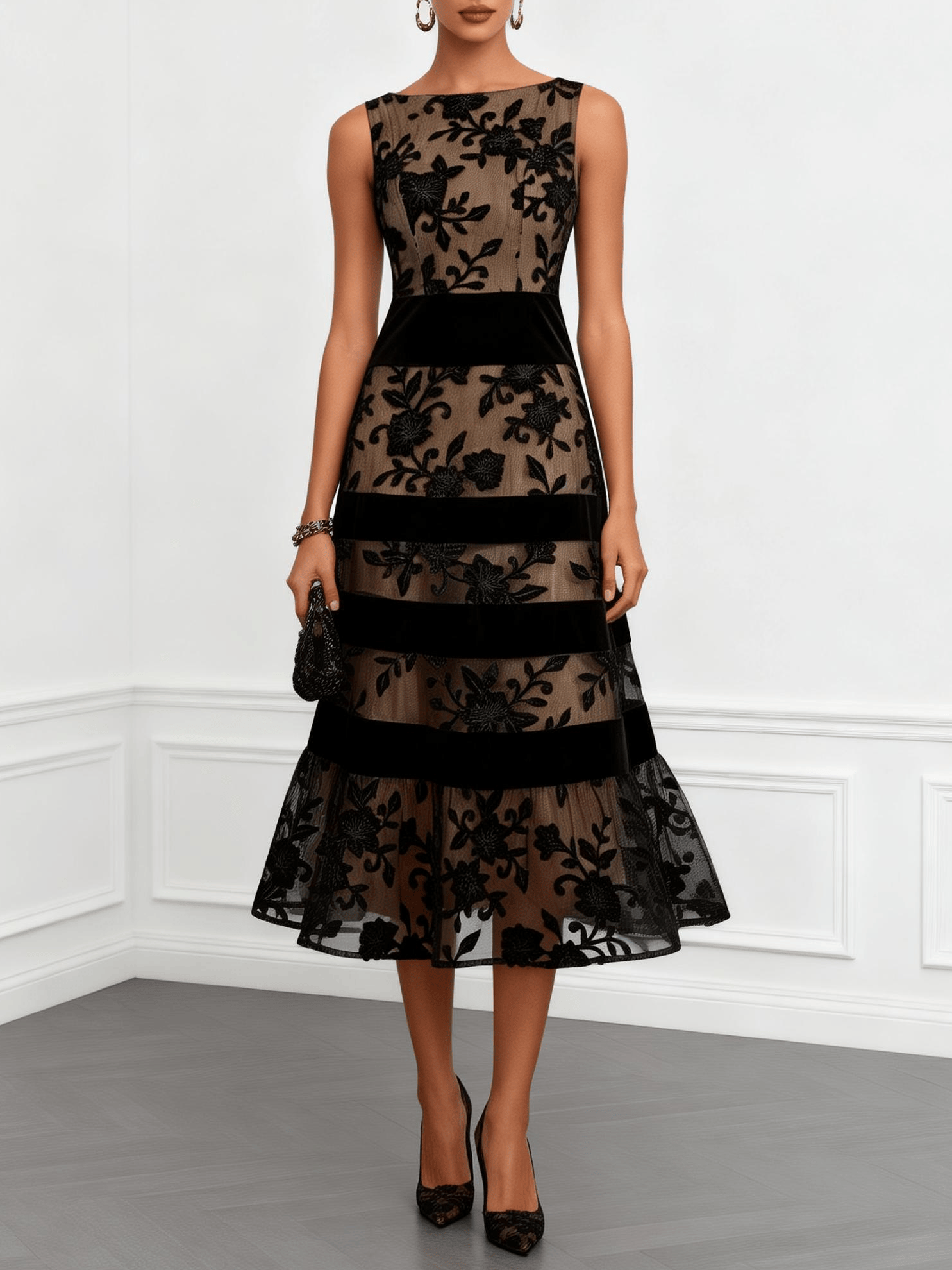 Robe midi sans manches en mesh noir avec motif floral, coupe évasée, col bateau, de la marque Danoir Paris.