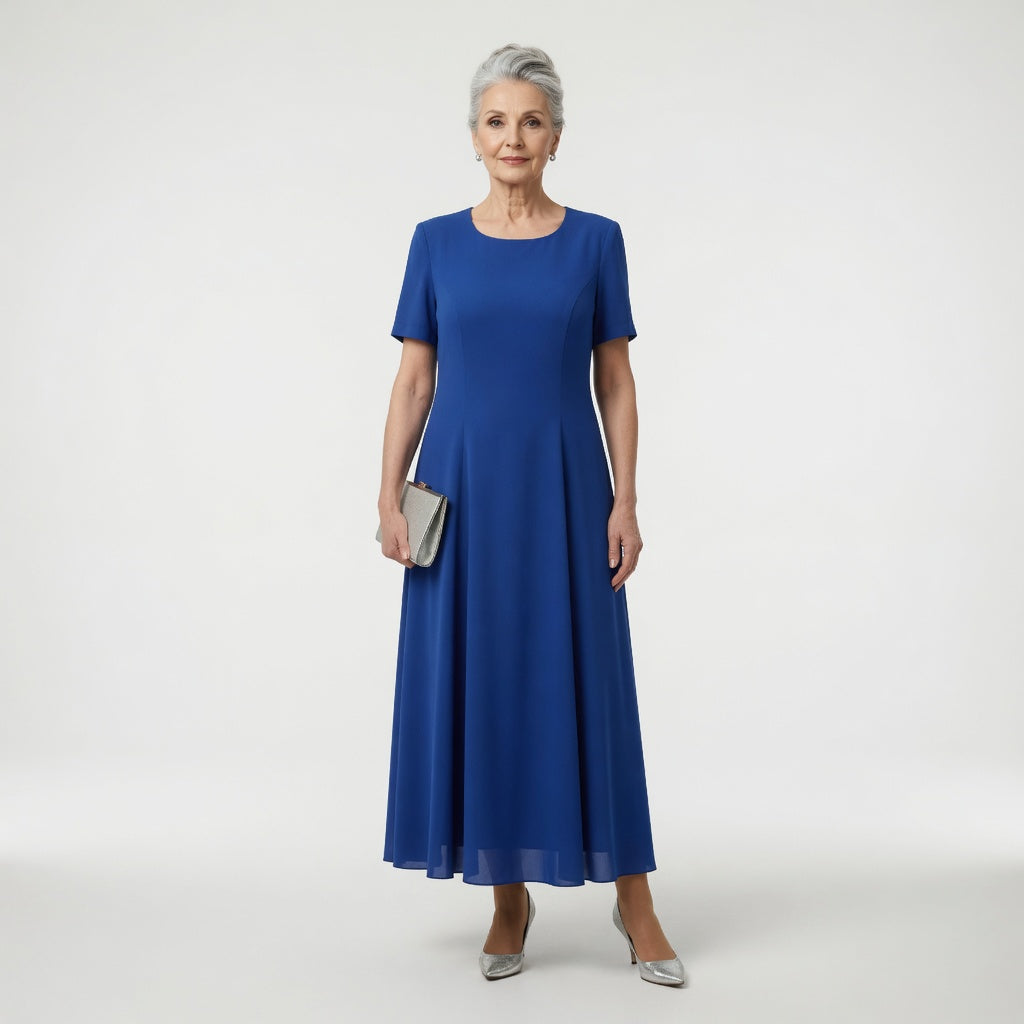 Robe longue de soirée bleue Nerina de Danoir Paris, élégante et sophistiquée, portée en occasion formelle.