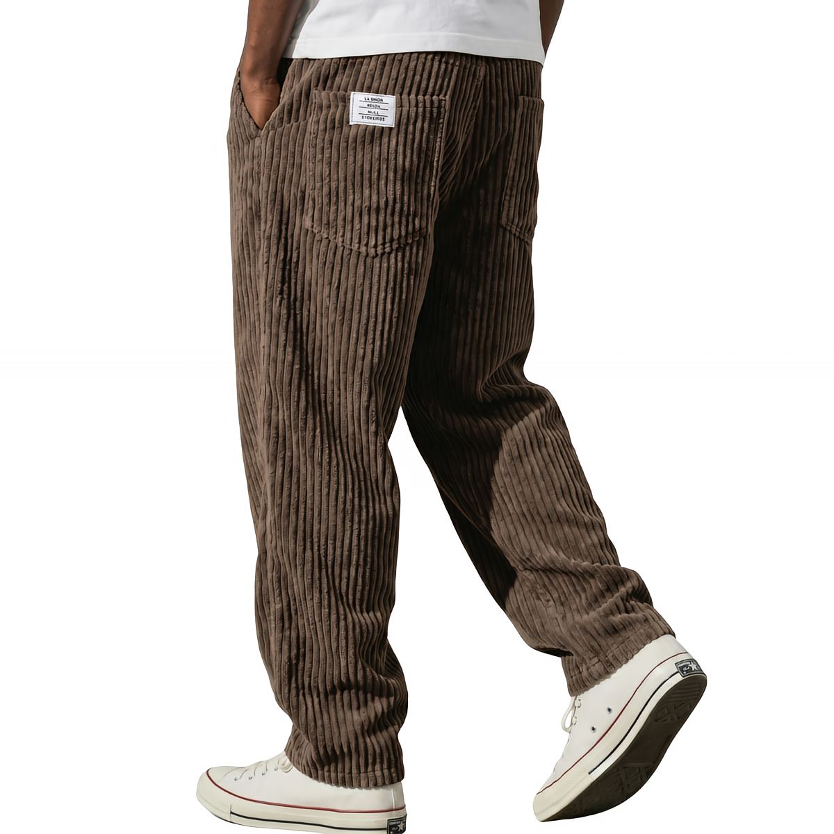 Pantalons en velours côtelé marron Danoir Paris, coupe droite, tissu doux et texturé, vue de face sur fond neutre.