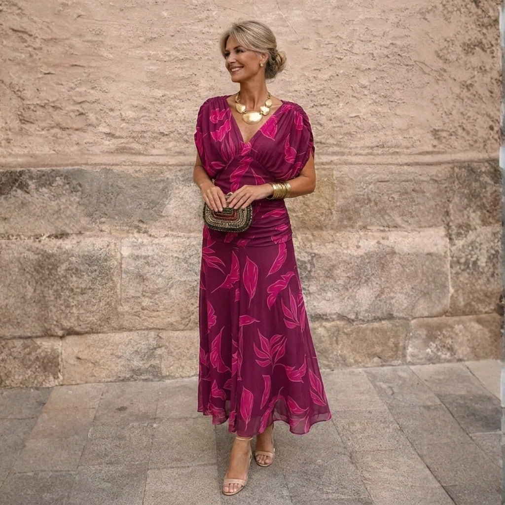 Robe longue femme Mikaela de Danoir Paris avec épaules dégagées, style élégant et fluide, portée en soirée ou occasion spéciale.