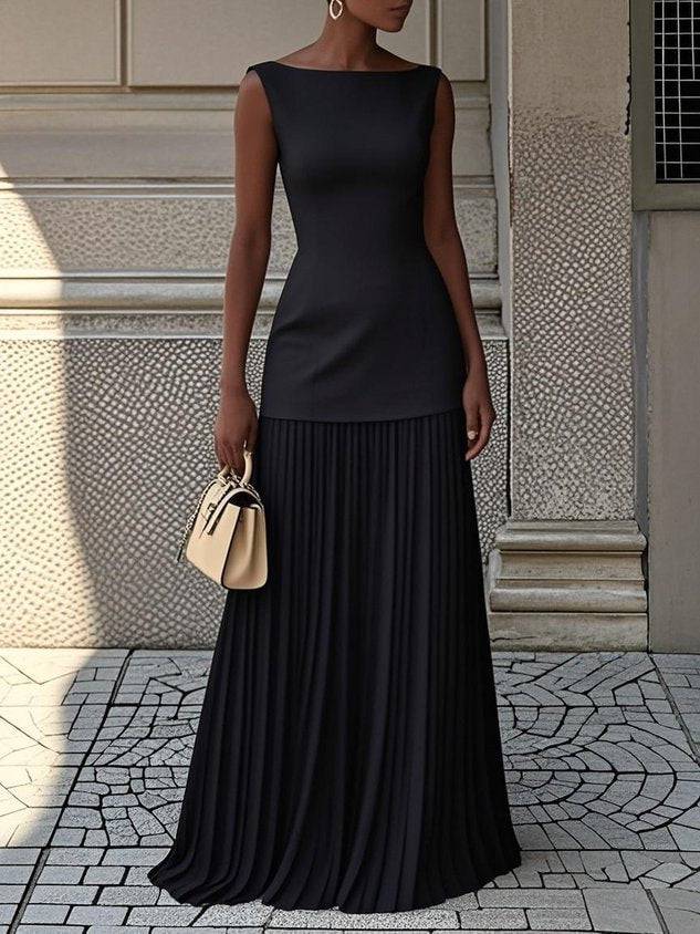 Robe longue plissée Serena™ de Danoir Paris, robe maxi élégante avec plis fins, en tissu fluide, vue de face sur fond neutre