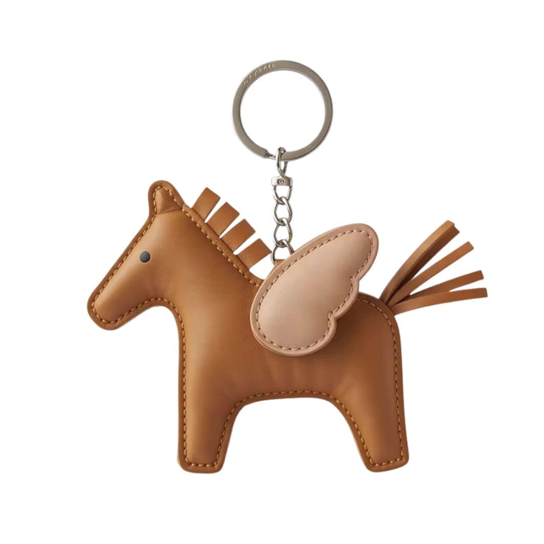 Breloque en cuir en forme de cheval de la marque Danoir Paris, avec un design élégant et détaillé, idéal pour accessoires.
