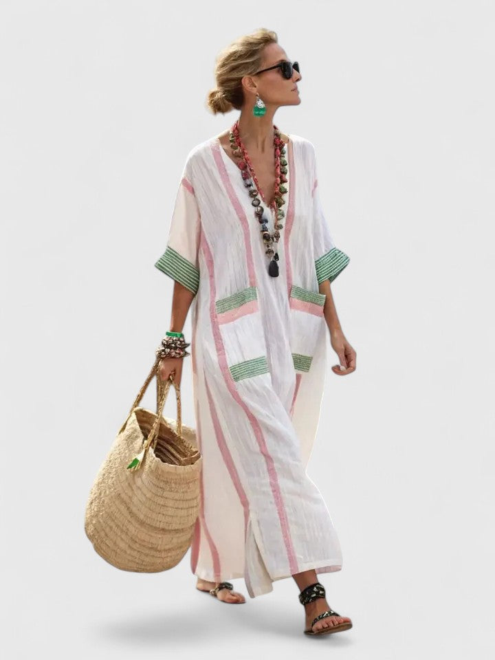 Robe longue maxi Kyvanna Danoir Paris avec motif floral, portée fluide et élégante, en tissu léger.