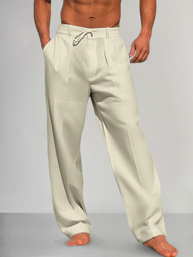 Pantalons droits en coton et lin Danoir Paris Torino, tissu léger et confortable, couleur neutre, porté dans un look décontracté.