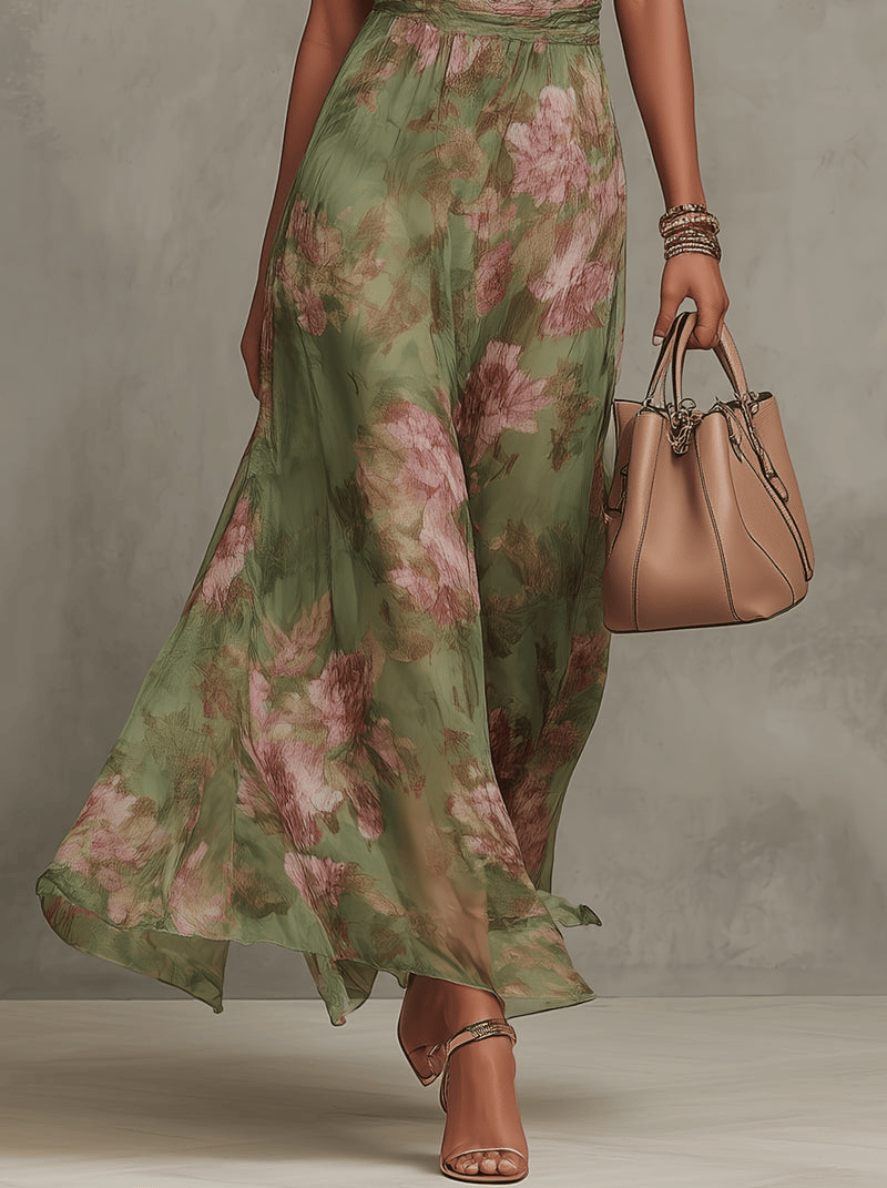 Robe longue fluide à fleurs Danoir Paris Livia, modèle maxi halter avec imprimé floral élégant, vue de face.