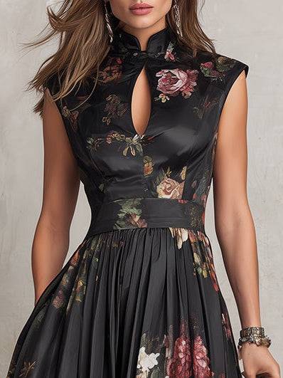 Robe midi en satin noir à col clé, motifs floraux et plis, de la marque Danoir Paris, vue de face sur mannequin.