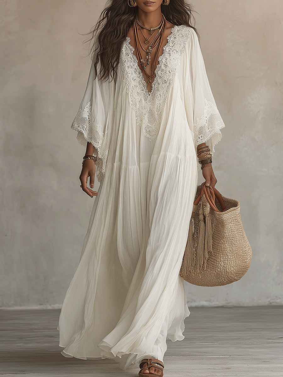 Robe longue en chiffon ivoire et dentelle Celeste de Danoir Paris, détail de la dentelle et du tissu fluide visible.