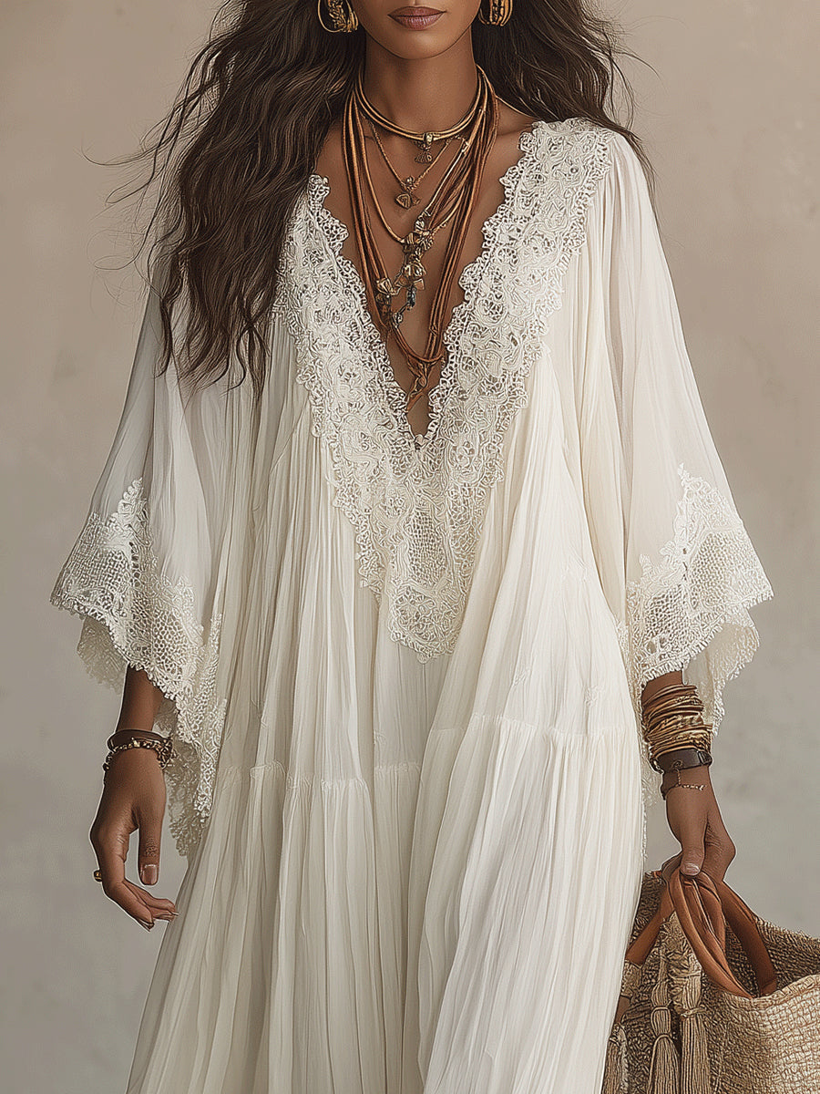 Robe longue en chiffon ivoire avec détails en dentelle, style élégant, de la marque Danoir Paris, vue de face.