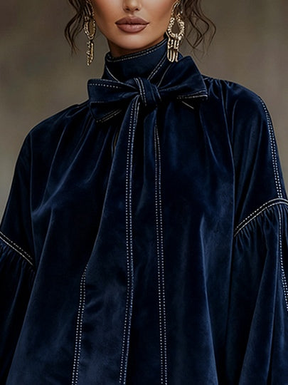 Robe mini en velours Tiphaine de Danoir Paris avec nœud, design élégant et tissu doux visible sur cette image.