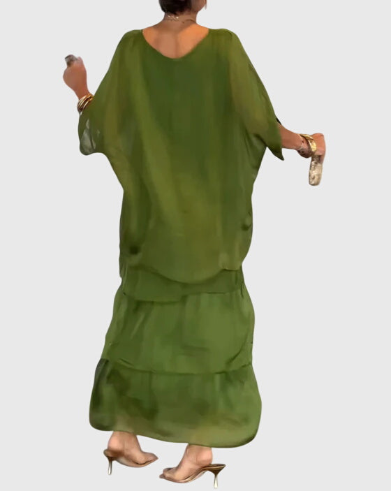 Robe longue Susan de Danoir Paris, vêtement élégant avec détails floraux, portée en soirée, vue de face sur mannequin.