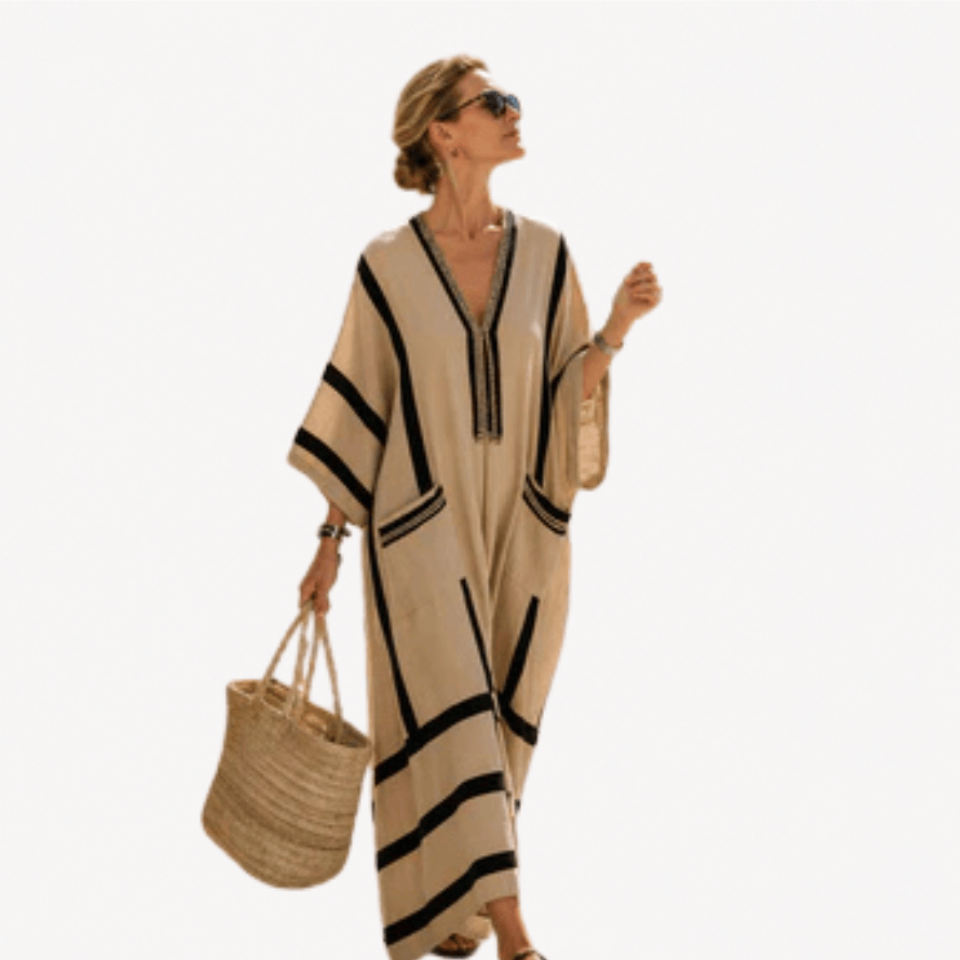 Caftán largo Danoir Paris en tissu léger avec motifs colorés et manches longues, idéal pour un style élégant et confortable.