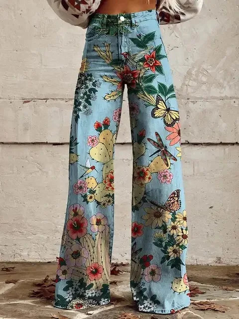 Pantalon floral décontracté et élégant Azly de Danoir Paris, tissu léger avec motif floral coloré, vue de face.
